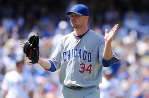 August 28, 2016; Los Angeles, CA, USA; Chicago Cubs starting pitcher Jon Lester (34) reacts after a double play ends the fourth inning against the Los Angeles Dodgers at Dodger Stadium. Mandatory Credit: Gary A. Vasquez-USA TODAY Sports