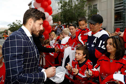 WASHINGTON, DC – OCTOBER 05: Michal Kempny #6 of the Washington Capitals signs autographs for fans on Rock The Red Carpet before the home opener against the Carolina Hurricanes at Capital One Arena on October 5, 2019 in Washington, DC. (Photo by Patrick McDermott/NHLI via Getty Images)