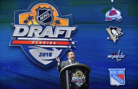 Jun 26, 2015; Sunrise, FL, USA; NHL commissioner Gary Bettman addresses the crowd before the first round of the 2015 NHL Draft at BB&T Center. Mandatory Credit: Steve Mitchell-USA TODAY Sports