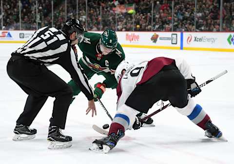 ST. PAUL, MN – MARCH 13: Minnesota Wild Center Mikko Koivu (9) and Colorado Avalanche Left Wing Gabriel Landeskog (92) face-off during a NHL game between the Minnesota Wild and Colorado Avalanche on March 13, 2018 at Xcel Energy Center in St. Paul, MN. The Avalanche defeated the Wild 5-1.(Photo by Nick Wosika/Icon Sportswire via Getty Images)