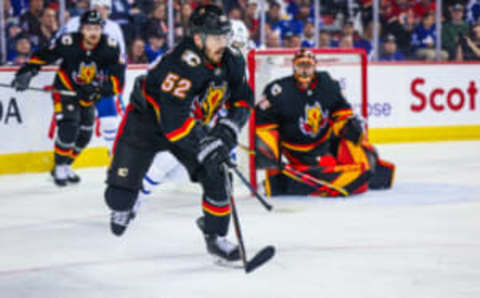 Mar 2, 2023; Calgary, Alberta, CAN; Calgary Flames defenseman MacKenzie Weegar (52) controls the puck against the Toronto Maple Leafs during the first period at Scotiabank Saddledome. Mandatory Credit: Sergei Belski-USA TODAY Sports