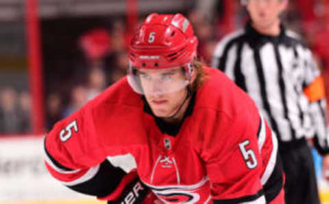 RALEIGH, NC – MARCH 26: Noah Hanifin #5 of the Carolina Hurricanes prepares for a faceoff during an NHL game on March 26, 2016 at PNC Arena in Raleigh, North Carolina. (Photo by Phil Ellsworth/NHLI via Getty Images)