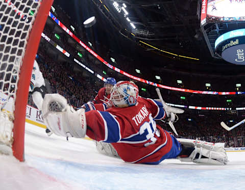 MONTREAL, QC – DECEMBER 15: The San Jose Sharks score a goal against Dustin Tokarski #35 of the Montreal Canadiens in the NHL game at the Bell Centre on December 15, 2015 in Montreal, Quebec, Canada. (Photo by Francois Lacasse/NHLI via Getty Images)