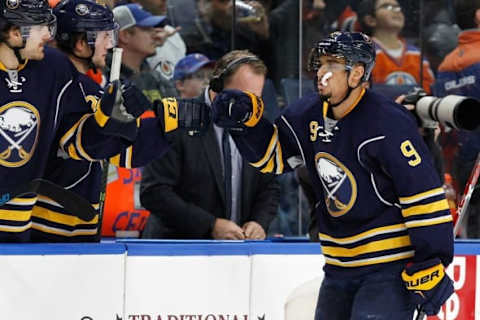 NHL Power Rankings: Buffalo Sabres left wing Evander Kane (9) celebrates with the bench after he scored the tying goal late in the third period against the Edmonton Oilers at KeyBank Center. Sabres beat the Oilers 4-3 in overtime. Mandatory Credit: Kevin Hoffman-USA TODAY Sports