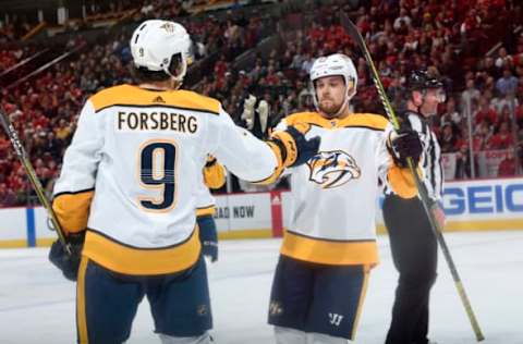 CHICAGO, IL – JANUARY 09: Viktor Arvidsson #33 and Filip Forsberg #9 of the Nashville Predators celebrate after Forsberg scored against the Chicago Blackhawks in the second period at the United Center on January 9, 2019, in Chicago, Illinois. (Photo by Bill Smith/NHLI via Getty Images)