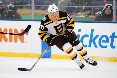 SOUTH BEND, INDIANA – JANUARY 01: Colby Cave #26 of the Boston Bruins skates in the second period against the Chicago Blackhawks during the 2019 Bridgestone NHL Winter Classic at Notre Dame Stadium on January 01, 2019 in South Bend, Indiana. (Photo by Gregory Shamus/Getty Images)