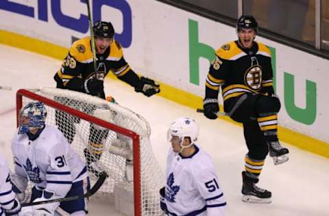 BOSTON, MA – APRIL 21: Boston Bruins Noel Acciari, right, celebrates his goal with Tim Schaller, left, behind Toronto goalie Frederik Andersen during the third period. The Boston Bruins host the Toronto Maple Leafs in Game 5 of the Eastern Conference First Round during the 2018 NHL Stanley Cup Playoffs at the TD Garden in Boston on April 21, 2018. (Photo by John Tlumacki/The Boston Globe via Getty Images)