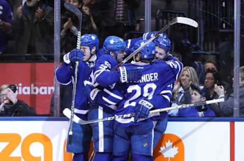 Feb 21, 2017; Toronto, Ontario, CAN; Toronto Maple Leafs defenseman Jake Gardiner (51) is congratulated by left wing Matt Martin (15) and (43) and center William Nylander (29) and center Auston Matthews (34) against the Winnipeg Jets at Air Canada Centre. The Maple Leafs beat the Jets 5-4 in overtime. Mandatory Credit: Tom Szczerbowski-USA TODAY Sports