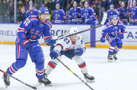 ST PETERSBURG, RUSSIA – DECEMBER 4, 2018: SKA St Petersburg’s Vladislav Gavrikov (L) and Torpedo Nizhny Novgorod’s Yuri Sergiyenko in action in their 2018/19 KHL Regular Season ice hockey match at St Petersburgs Ice Palace. Peter Kovalev/TASS (Photo by Peter KovalevTASS via Getty Images)