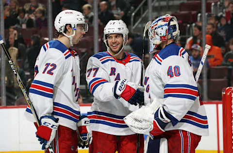 PHILADELPHIA, PA – MARCH 31: Filip Chytil #72, Tony DeAngelo #77, and Alexandar Georgiev #40 of the New York Rangers celebrate after defeating the Philadelphia Flyers 3-0 on March 31, 2019 at the Wells Fargo Center in Philadelphia, Pennsylvania. (Photo by Len Redkoles/NHLI via Getty Images)