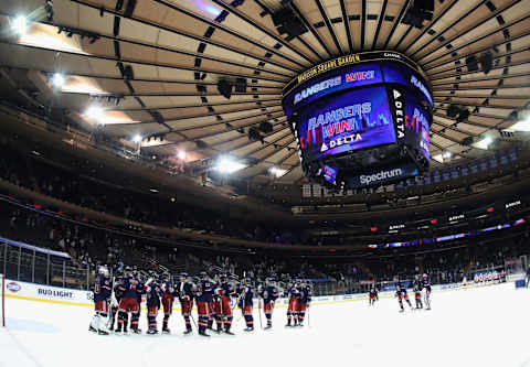 The New York Rangers celebrate their 9-0 victory over the Philadelphia Flyers at Madison Square Garden on March 17, 2021(Photo by Bruce Bennett/Getty Images)