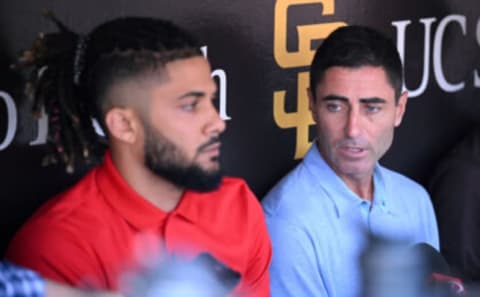 A.J. Preller alongside troubled shortstop Fernando Tatis Jr. Orlando Ramirez-USA TODAY Sports