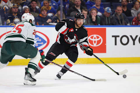 Jan 7, 2023; Buffalo, New York, USA; Buffalo Sabres center Tyson Jost (17) looks to make a pass during the second period against the Minnesota Wild at KeyBank Center. Mandatory Credit: Timothy T. Ludwig-USA TODAY Sports