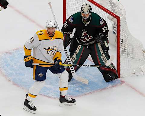 Nashville Predators forward Nick Bonino (13) tries to screen Arizona Coyotes goaltender Darcy Kuemper (35)  Mandatory Credit: Perry Nelson-USA TODAY Sports