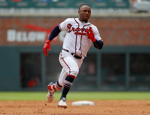 ATLANTA, GA – SEPTEMBER 05: Ozzie Albbies #1 of the Atlanta Braves advances to third base after hitting a triple in the fifth inning against the Boston Red Sox at SunTrust Park on September 5, 2018 in Atlanta, Georgia. (Photo by Kevin C. Cox/Getty Images)