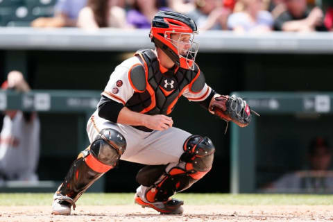 Apr 14, 2016; Denver, CO, USA; San Francisco Giants catcher Buster Posey (28) in the third inning against the Colorado Rockies at Coors Field. Mandatory Credit: Isaiah J. Downing-USA TODAY Sports