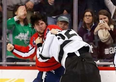 Feb 16, 2016; Washington, DC, USA; Washington Capitals right wing Tom Wilson (43) fights Los Angeles Kings defenseman Luke Schenn (52) at Verizon Center. Mandatory Credit: Geoff Burke-USA TODAY Sports