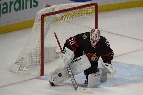 Jan 16, 2021; Ottawa, Ontario, CAN; Ottawa Senators goalie Matt Murray (30) makes a save in the third period against the Toronto Maple Leafs at the Canadian Tire Centre. Mandatory Credit: Marc DesRosiers-USA TODAY Sports