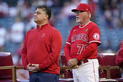 GM Perry Minasian (left) with fired manager Joe Maddon. Kirby Lee-USA TODAY Sports