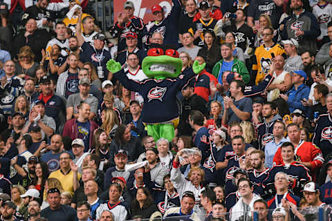 COLUMBUS, OH – APRIL 18: Columbus Blue Jackets mascot Stinger cheers with fans during a game against the Pittsburgh Penguins in Game Four of the Eastern Conference First Round during the 2017 NHL Stanley Cup Playoffs on April 18, 2017 at Nationwide Arena in Columbus, Ohio. Columbus defeated Pittsburgh 5-4. (Photo by Jamie Sabau/NHLI via Getty Images)