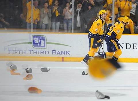 Feb 27, 2016; Nashville, TN, USA; Nashville Predators left winger Filip Forsberg (9) celebrates with right winger Craig Smith (15) after a hat trick during the second period against the St. Louis Blues at Bridgestone Arena. Mandatory Credit: Christopher Hanewinckel-USA TODAY Sports