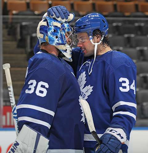 TORONTO, ON – JANUARY 1: Auston Matthews #34 of the Toronto Maple Leafs congratulates teammate Jack Campbell #36 on his shutout  (Photo by Claus andersen/Getty Images)