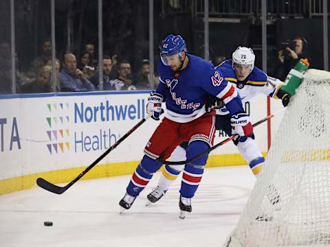 NEW YORK, NEW YORK – MARCH 03: Brendan Smith #42 of the New York Rangers skates against Oskar Sundqvist #70 of the St. Louis Blues during their game at Madison Square Garden on March 03, 2020 in New York City. (Photo by Al Bello/Getty Images)