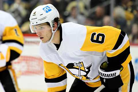 PITTSBURGH, PENNSYLVANIA – APRIL 21: John Marino #6 of the Pittsburgh Penguins looks on during a game between the Pittsburgh Penguins and Boston Bruins at PPG PAINTS Arena on April 21, 2022 in Pittsburgh, Pennsylvania. (Photo by Emilee Chinn/Getty Images)