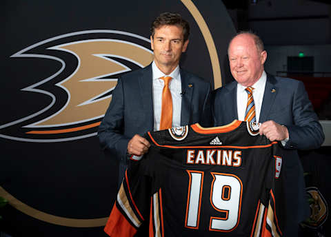 IRVINE, CA – JUNE 17: The new Anaheim Ducks Head Coach Dallas Eakins, left, was presented with a Ducks jersey by General Manager Bob Murray during a press conference at Great Park Ice in Irvine, CA on Monday, June 17, 2019. Eakins is the Ducks 10th head coach. He was most recently head coach at the San Diego Gulls of the American Hockey League (AHL). (Photo by Paul Bersebach/MediaNews Group/Orange County Register via Getty Images)