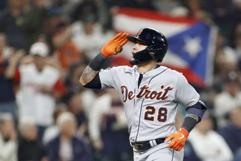 SEATTLE, WASHINGTON – OCTOBER 03: Javier Baez #28 of the Detroit Tigers reacts as a fan waves a Puerto Rican flag after his two-run home run against the Seattle Mariners during the third inning at T-Mobile Park on October 03, 2022 in Seattle, Washington. (Photo by Steph Chambers/Getty Images)