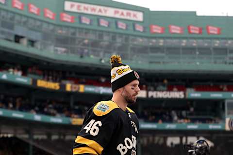 Jan 2, 2023; Boston, Massachusetts, USA; Boston Bruins center David Krejci (46) walks onto the ice before a game against the Pittsburgh Penguins during the 2023 Winter Classic ice hockey game at Fenway Park. Mandatory Credit: Paul Rutherford-USA TODAY Sports