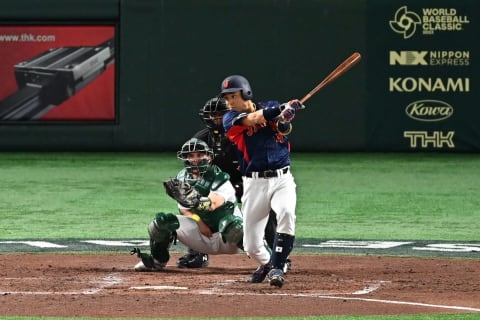 Yuhei Nakamura lines one of his three hits. (Photo by Kenta Harada/Getty Images)