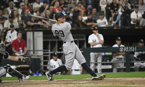 Aug 14, 2021; Chicago, Illinois, USA; New York Yankees right fielder Aaron Judge (99) hits a home run during the eighth inning against the Chicago White Sox at Guaranteed Rate Field. Mandatory Credit: Matt Marton-USA TODAY Sports