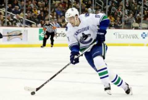 Jan 23, 2016; Pittsburgh, PA, USA; Vancouver Canucks right wing Radim Vrbata (17) carries the puck against the Pittsburgh Penguins during the first period at the CONSOL Energy Center. Mandatory Credit: Charles LeClaire-USA TODAY Sports