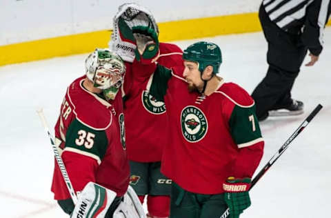 NHL Power Rankings: Minnesota Wild goalie Darcy Kuemper (35) celebrates with forward Chris Stewart (7) following the game against the Los Angeles Kings at Xcel Energy Center. The Wild defeated the Kings 6-3. Mandatory Credit: Brace Hemmelgarn-USA TODAY Sports