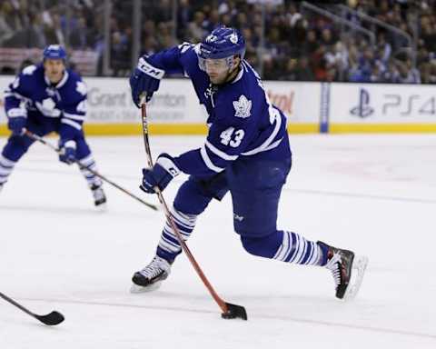 Jan 21, 2016; Toronto, Ontario, CAN; Toronto Maple Leafs forward Nazem Kadri (43) takes a shot against the Carolina Hurricanes during the second period at the Air Canada Centre. Mandatory Credit: John E. Sokolowski-USA TODAY Sports