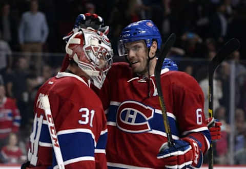 Oct 6, 2016; Montreal, Quebec, CAN; Montreal Canadiens goalie Carey Price (31) and teammate Shea Weber (6) react after defeating the Toronto Maple Leafs during a preseason hockey game at the Bell Centre. Mandatory Credit: Eric Bolte-USA TODAY Sports