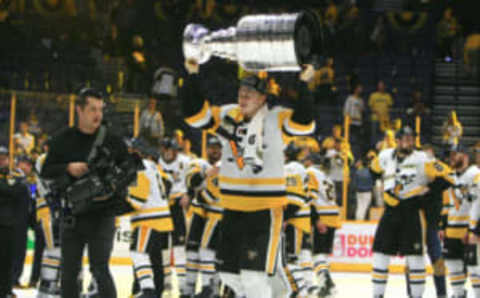 NASHVILLE, TN – JUNE 11: Pittsburgh Penguins defenseman Olli Maatta (3) skates with the Stanley Cup following Game 6 of the Stanley Cup Final between the Nashville Predators and the Pittsburgh Penguins, held on June 11, 2017, at Bridgestone Arena in Nashville, Tennessee. Pittsburgh won the game 2-0 and the series 4-2. (Photo by Danny Murphy/Icon Sportswire via Getty Images)