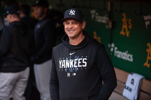 Jun 27, 2023; Oakland, California, USA; New York Yankees manager Aaron Boone (17) smiles before the game against the Oakland Athletics at Oakland-Alameda County Coliseum. Mandatory Credit: Ed Szczepanski-USA TODAY Sports