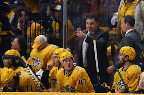 Nov 26, 2023; Nashville, Tennessee, USA; Nashville Predators head coach Andrew Brunette talks to players from the bench before a face off during the third period against the Winnipeg Jets at Bridgestone Arena. Mandatory Credit: Christopher Hanewinckel-USA TODAY Sports