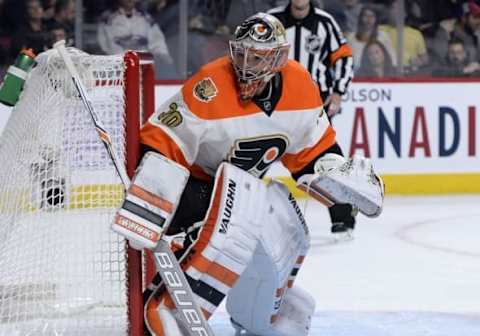 NHL Trade Rumors: Philadelphia Flyers goalie Michael Neuvirth (30) during the second period of the game against the Montreal Canadiens at the Bell Centre. Mandatory Credit: Eric Bolte-USA TODAY Sports