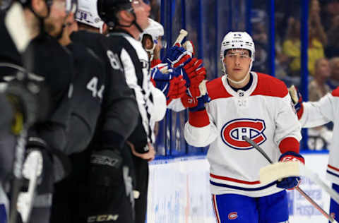 TAMPA, FLORIDA – APRIL 02: Corey Schueneman #64 of the Montreal Canadiens celebrates a goal in the second period during a game against the Tampa Bay Lightning at Amalie Arena on April 02, 2022 in Tampa, Florida. (Photo by Mike Ehrmann/Getty Images)