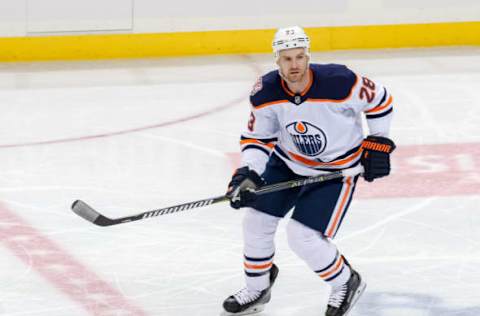 WINNIPEG, MB – DECEMBER 13: Kyle Brodziak #28 of the Edmonton Oilers keeps an eye on the play during first period action against the Winnipeg Jets at the Bell MTS Place on December 13, 2018 in Winnipeg, Manitoba, Canada. The Jets defeated the Oilers 5-4 in overtime. (Photo by Jonathan Kozub/NHLI via Getty Images)