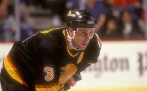 LANDOVER, MD – JANUARY 5: Doug Lidster #3 of the Vancouver Canucks looks on during a hockey game against the Washington Capitals on January 5, 1990 at the USAir Arena in Landover, Maryland. (Photo by Mitchell Layton/Getty Images)