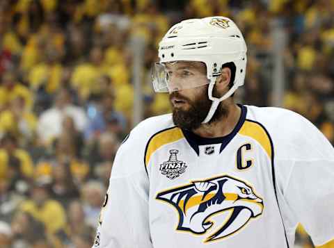 Jun 8, 2017; Pittsburgh, PA, USA; Nashville Predators center Mike Fisher (12) looks on against the Pittsburgh Penguins during the first period in game five of the 2017 Stanley Cup Final at PPG PAINTS Arena. Mandatory Credit: Charles LeClaire-USA TODAY Sports