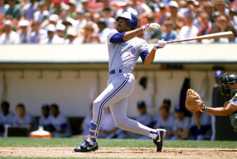 OAKLAND, CA – 1989: George Bell #11 of the Toronto Blue Jays swings at a pitch during a 1989 game against the Oakland Athletics at the Oakland-Alameda Coliseum in Oakland, California. (Photo by Otto Greule Jr/Getty Images)