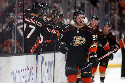 Mar 12, 2023; Anaheim, California, USA; Anaheim Ducks center Mason McTavish (37) celebrates with teammates after scoring a goal during the third period at Honda Center. Mandatory Credit: Kiyoshi Mio-USA TODAY Sports