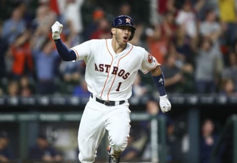 Houston, TX, USA; Houston Astros shortstop Carlos Correa (1) is thrilled to be ranked the most valuable shortstop in baseball this Christmas 2016. Mandatory Credit: Troy Taormina-USA TODAY Sports