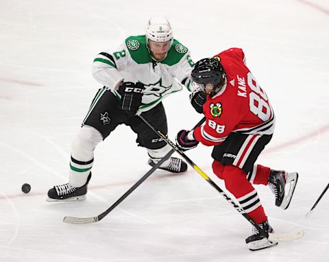 Patrick Kane #88, Chicago Blackhawks; Jamie Oleksiak #2, Dallas Stars (Photo by Jonathan Daniel/Getty Images)