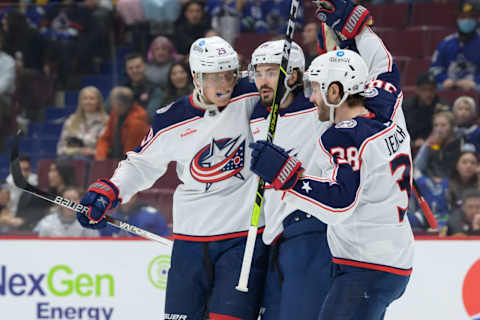 VANCOUVER, CANADA – JANUARY 27: Kirill Marchenko #86 of the Columbus Blue Jackets is congratulated by Patrik Laine #29 and Boone Jenner #38 after scoring a goal against the Vancouver Canucks during the first period of their NHL game at Rogers Arena on January 27, 2023 in Vancouver, British Columbia, Canada. (Photo by Derek Cain/Getty Images)